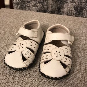 White pediped closed toed sandals